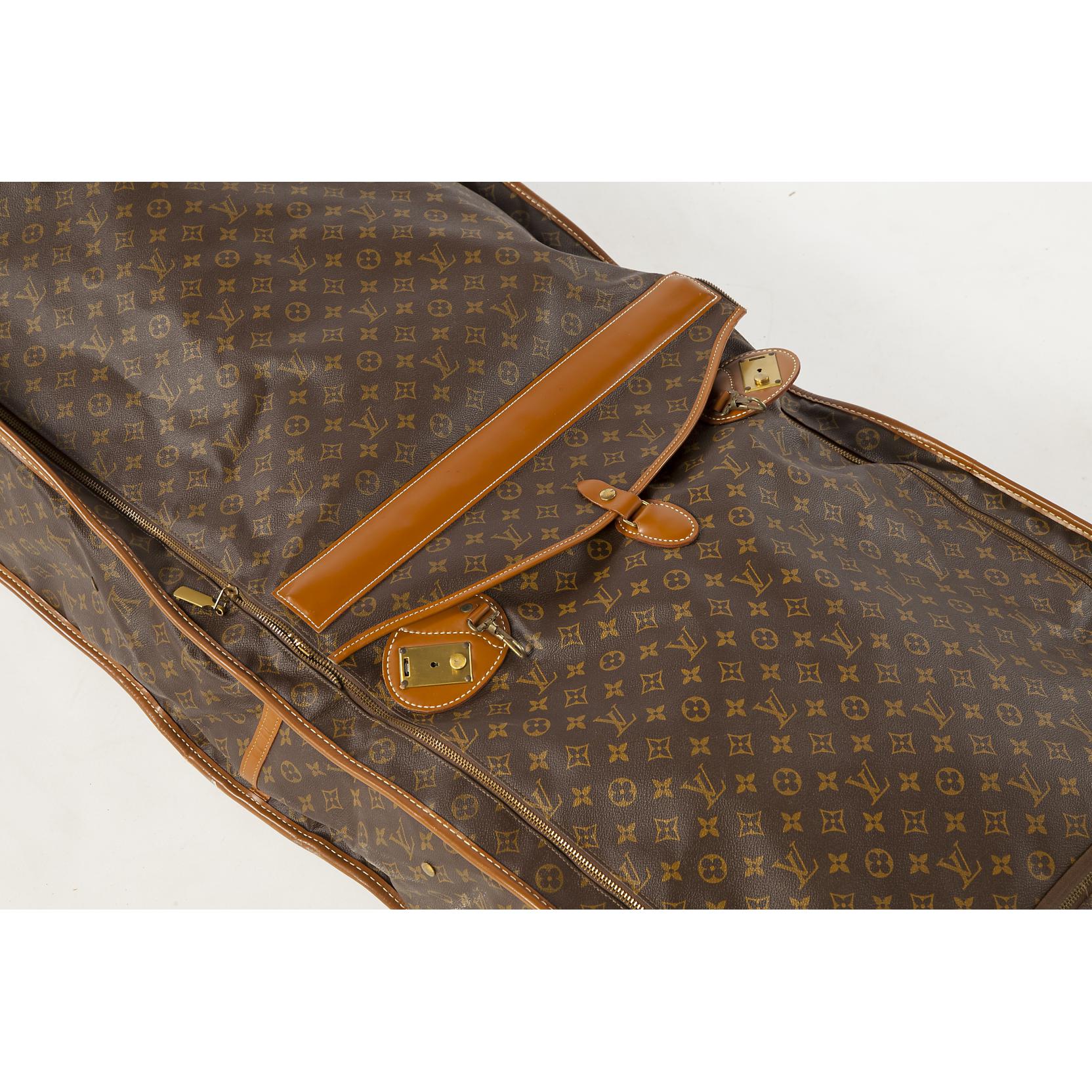 Sold at Auction: Vintage Louis Vuitton Monogram Leather Garment Bag