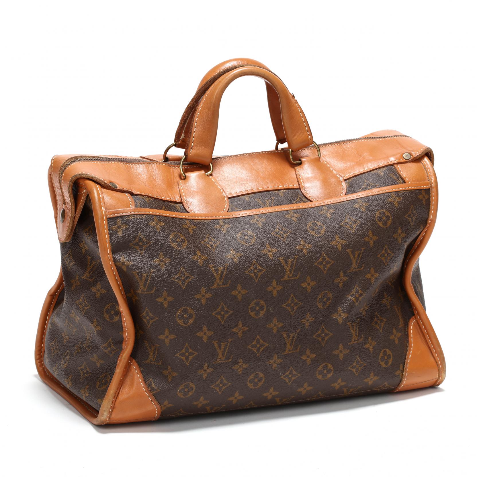 A Louis Vuitton Travelling Case Auction