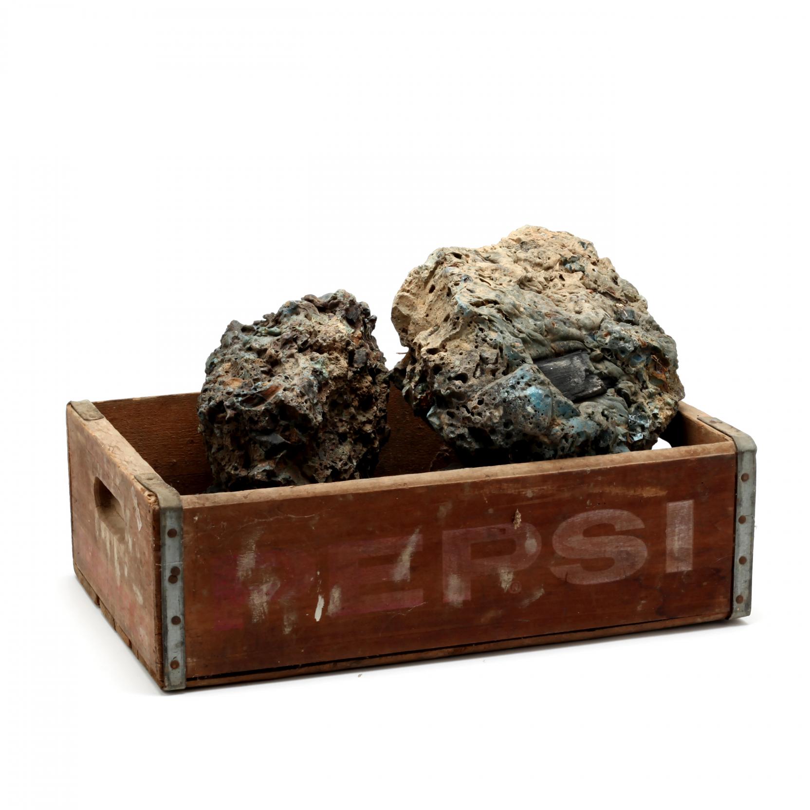 A Collection of Rock Specimens in a Pepsi-Cola Crate (Lot