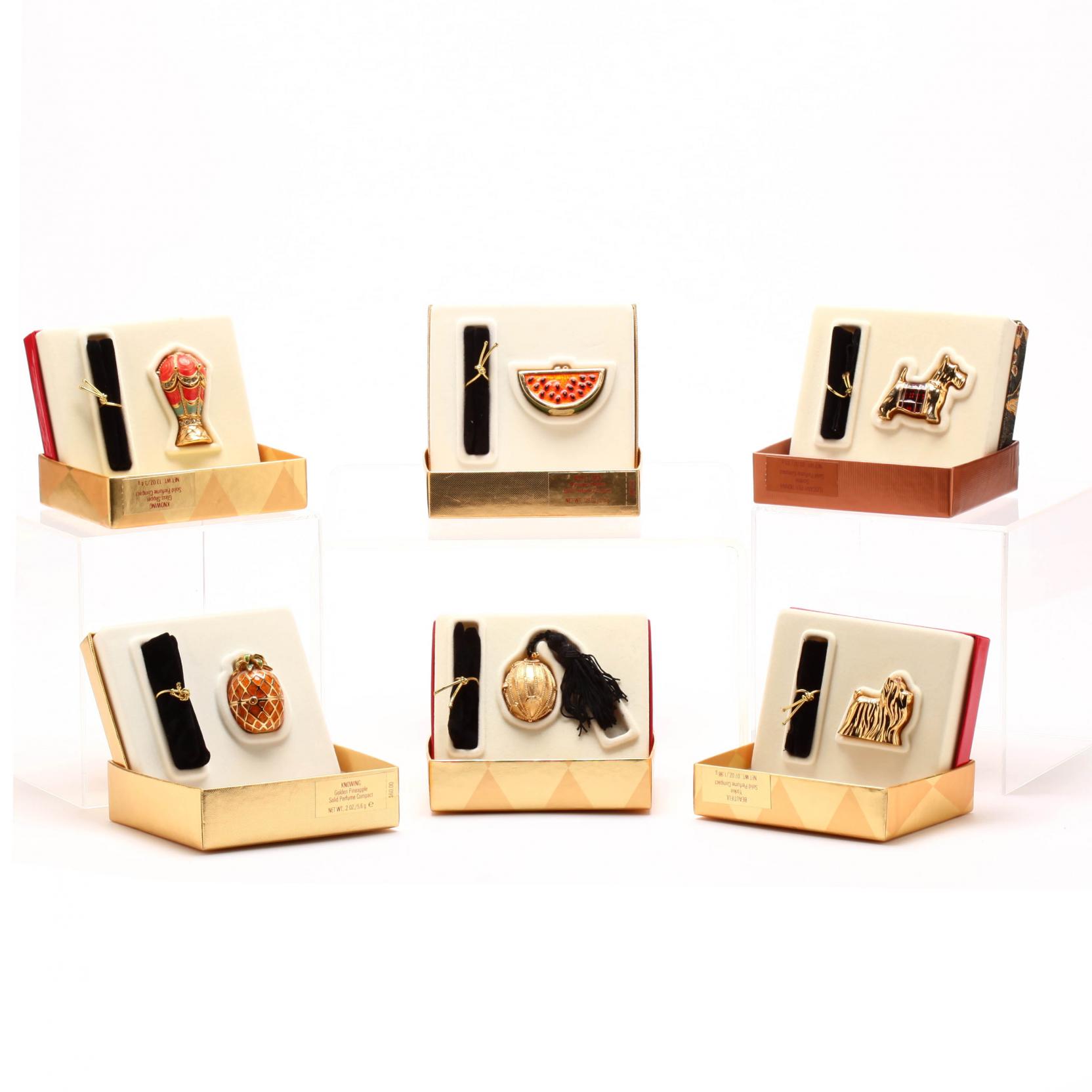 group-of-six-estee-lauder-solid-perfumes-boxed-editions