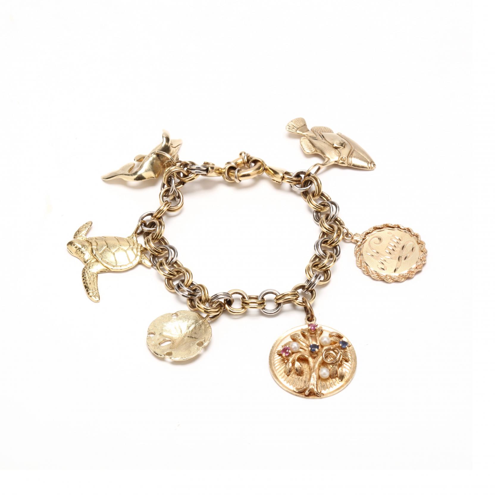 18kt-two-color-gold-charm-bracelet-with-gold-charms