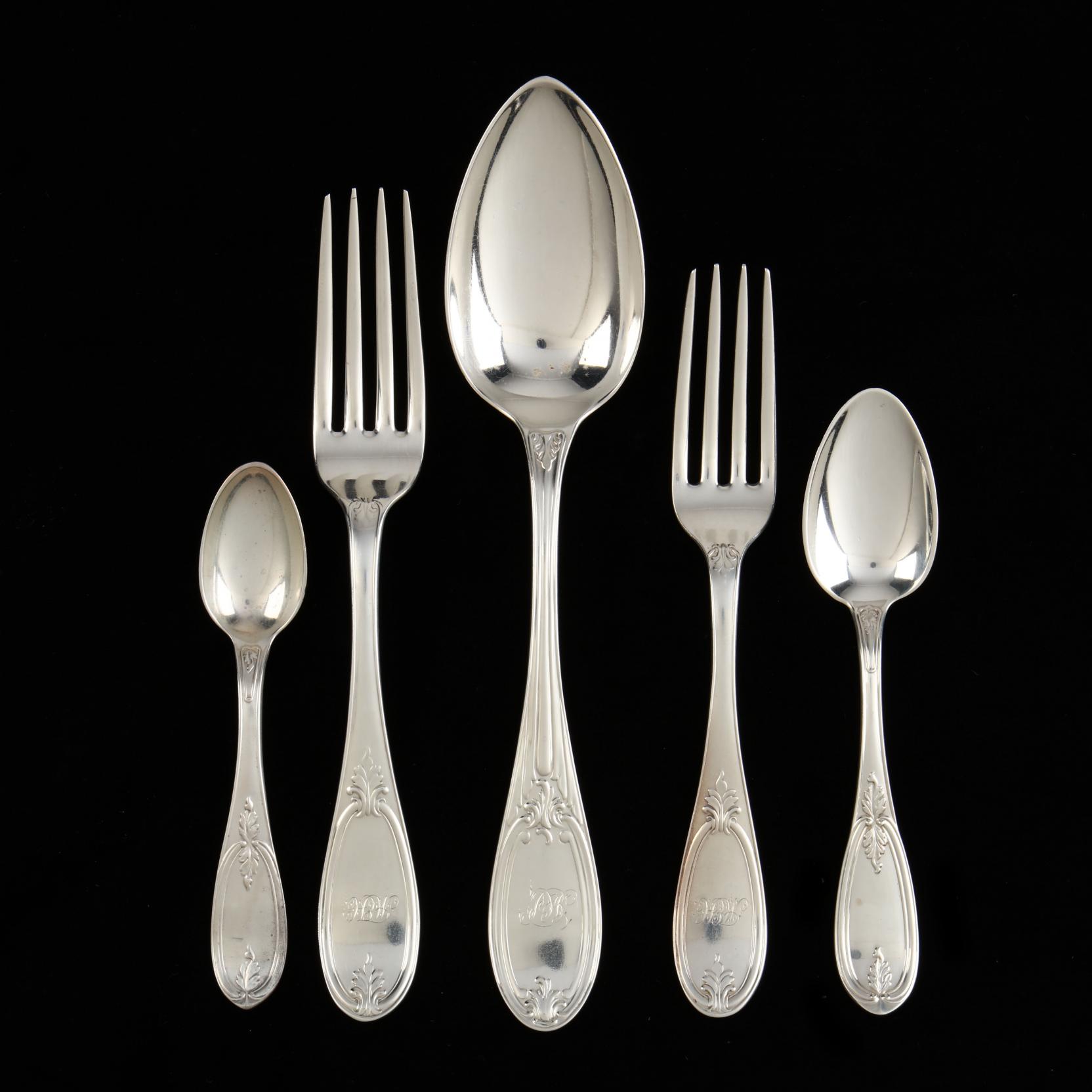 an-assembled-partial-set-of-coin-silver-flatware