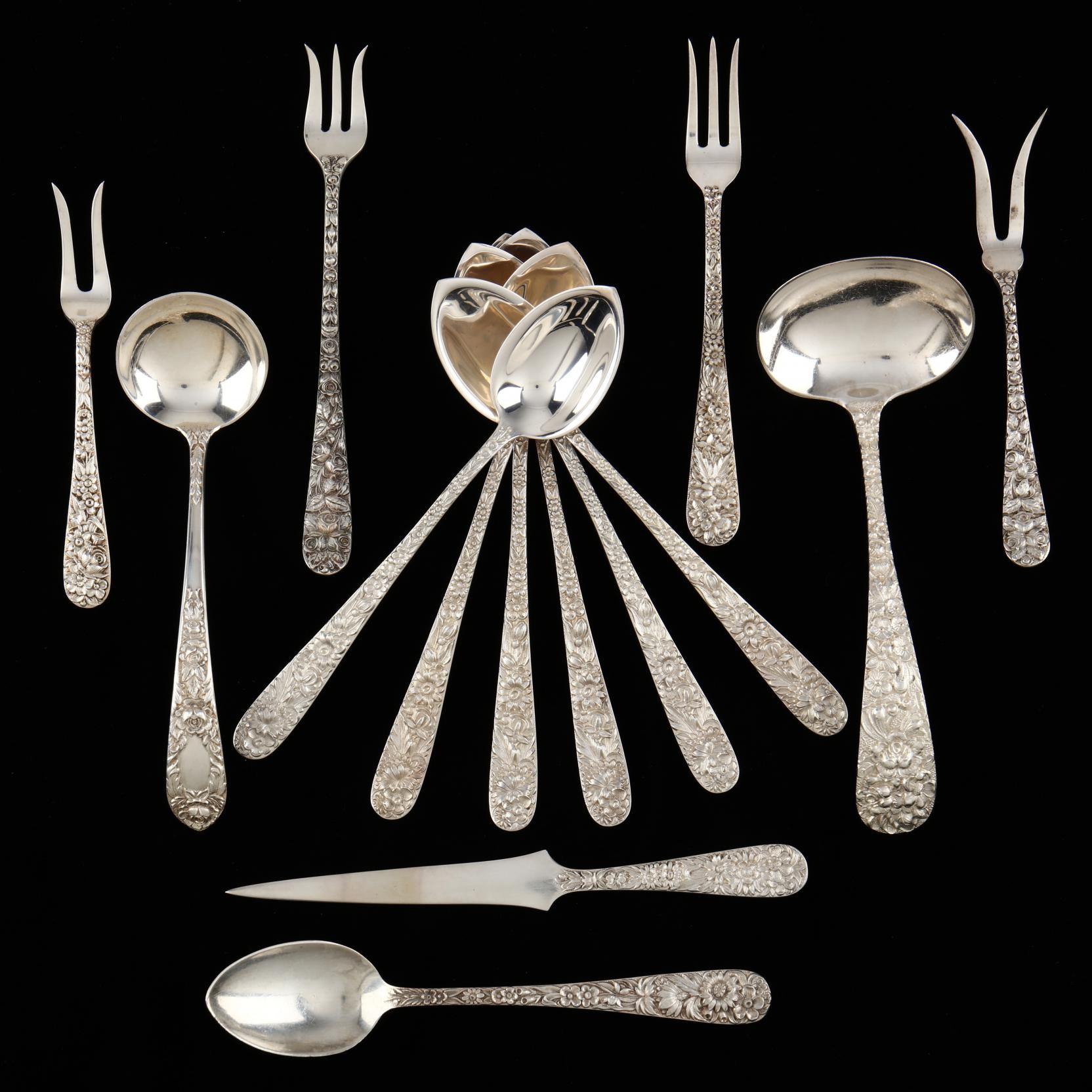 a-group-of-repousse-sterling-silver-flatware