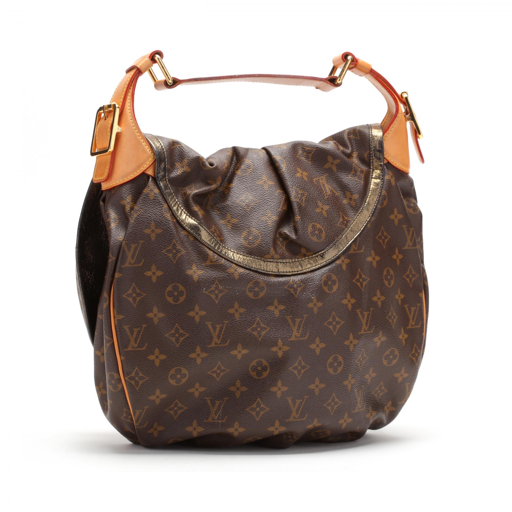 At Auction: Louis Vuitton, Louis Vuitton L Hobo Mahina Leather Brown