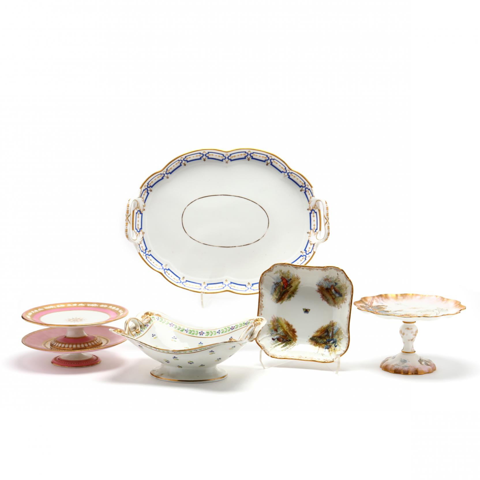 a-selection-of-elaborate-antique-porcelain-serving-pieces