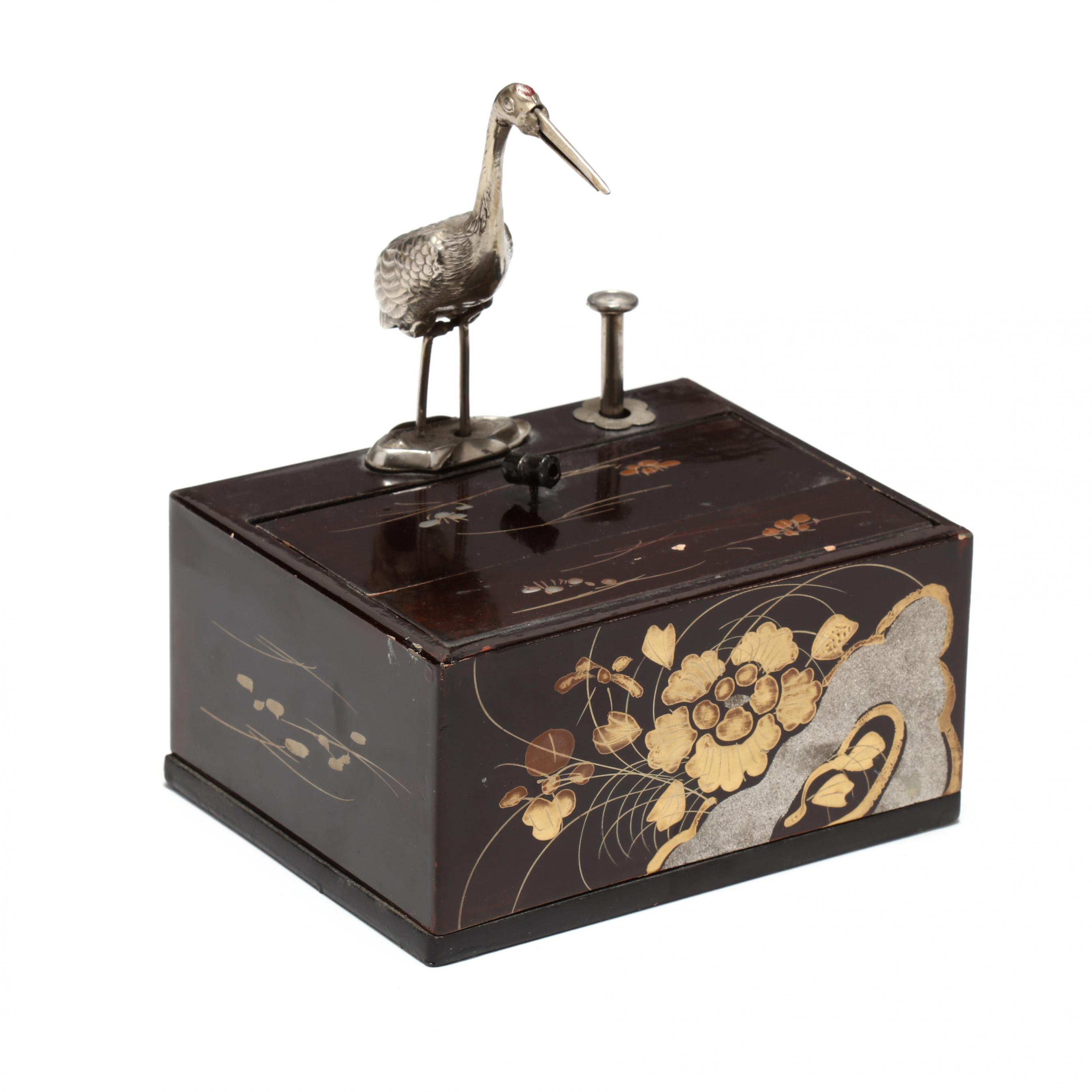 mechanical cigarette dispenser A Vintage Japanese Mechanical Cigarette Dispenser with Metal Crane (Lot 22