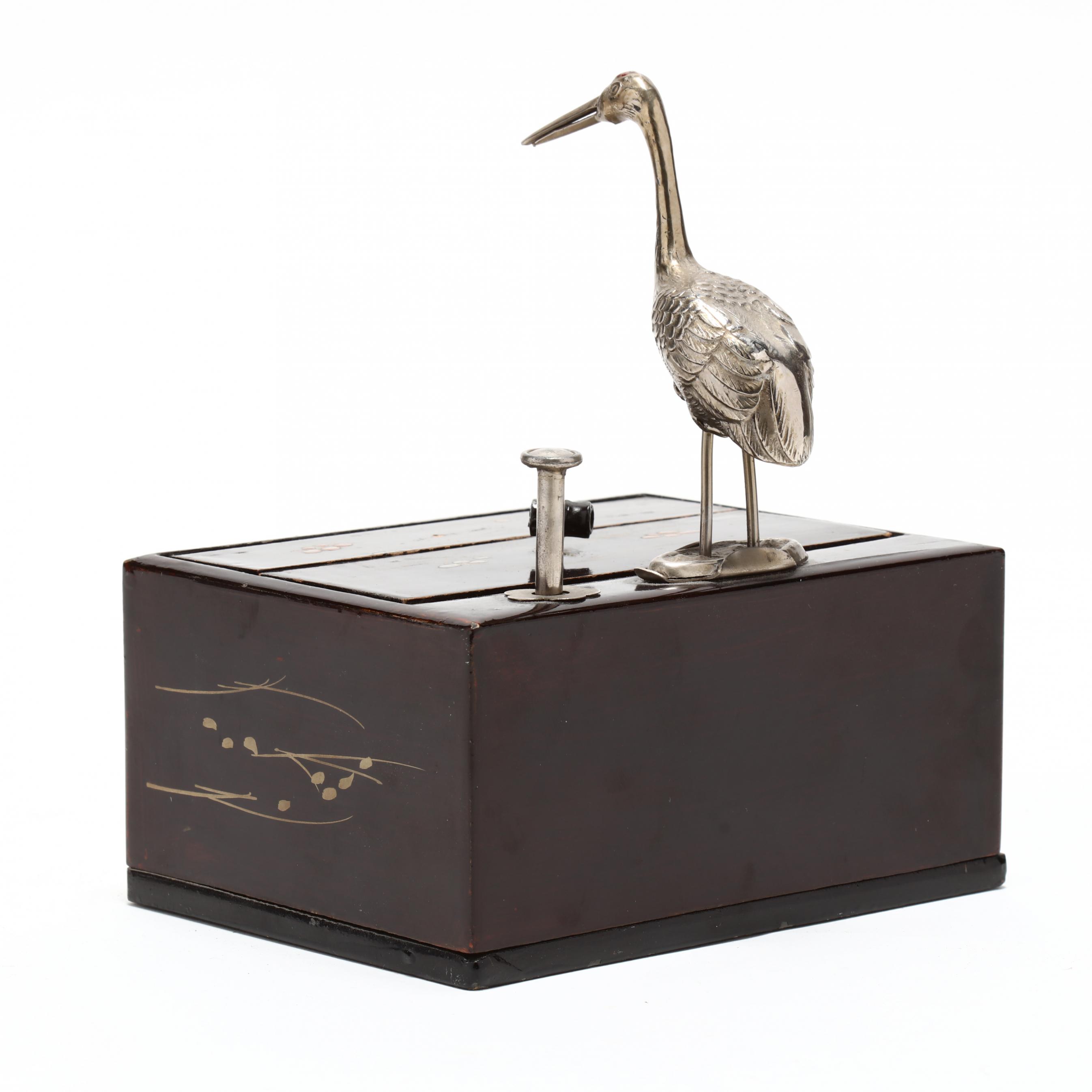 vintage japanese cigarette box A Vintage Japanese Mechanical Cigarette Dispenser with Metal Crane (Lot 22