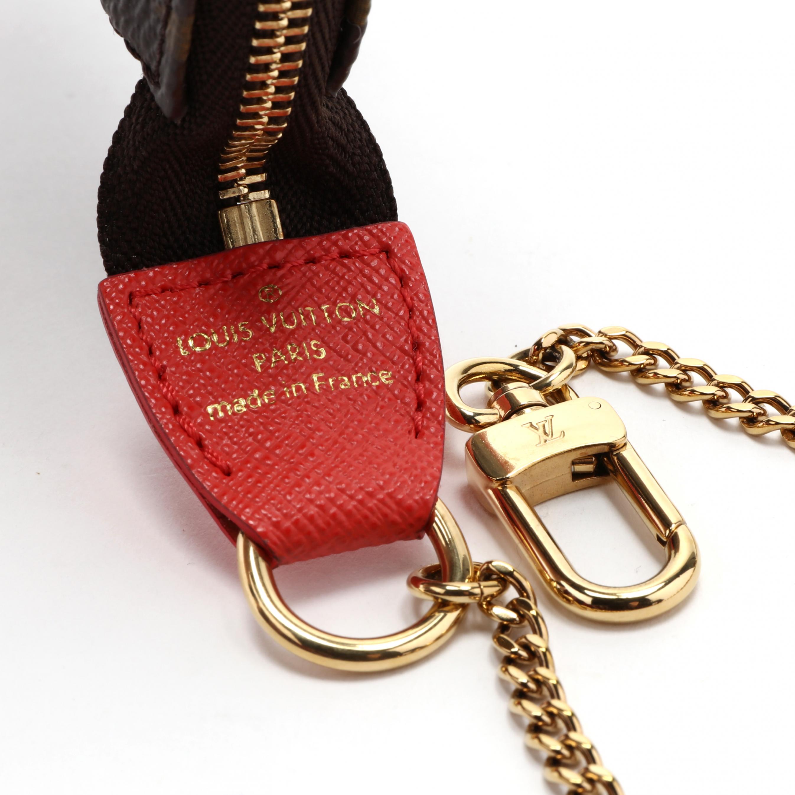 Authentic Louis Vuitton Mini Pochette Wristlet With Chain for Sale in  Laveen Village, AZ - OfferUp