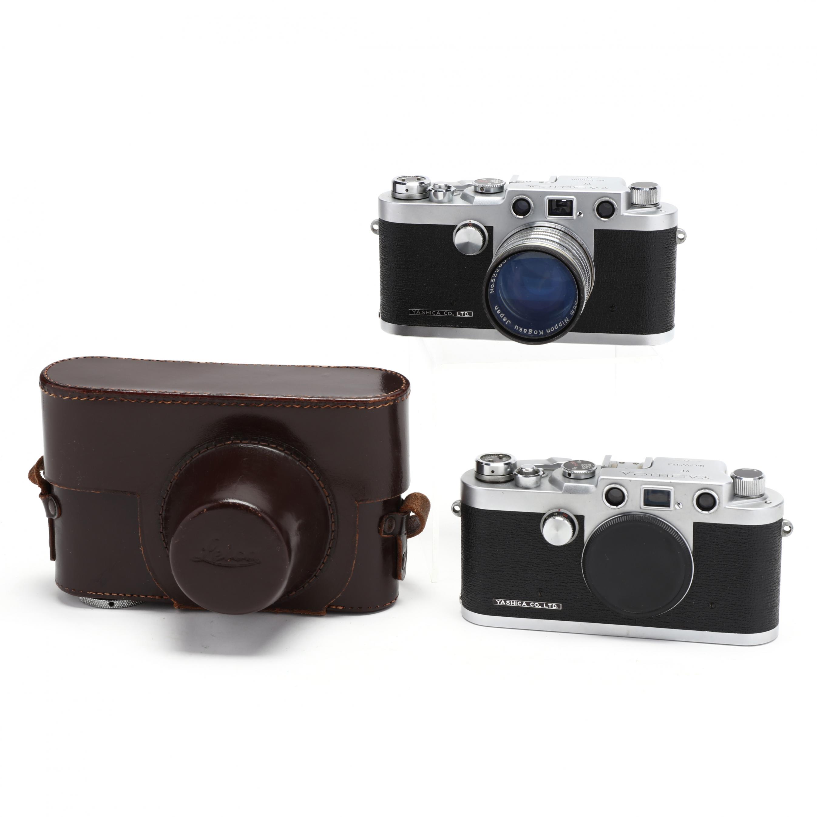Two Vintage Yashica YE Cameras, One with Nikkor Lens (Lot 2300