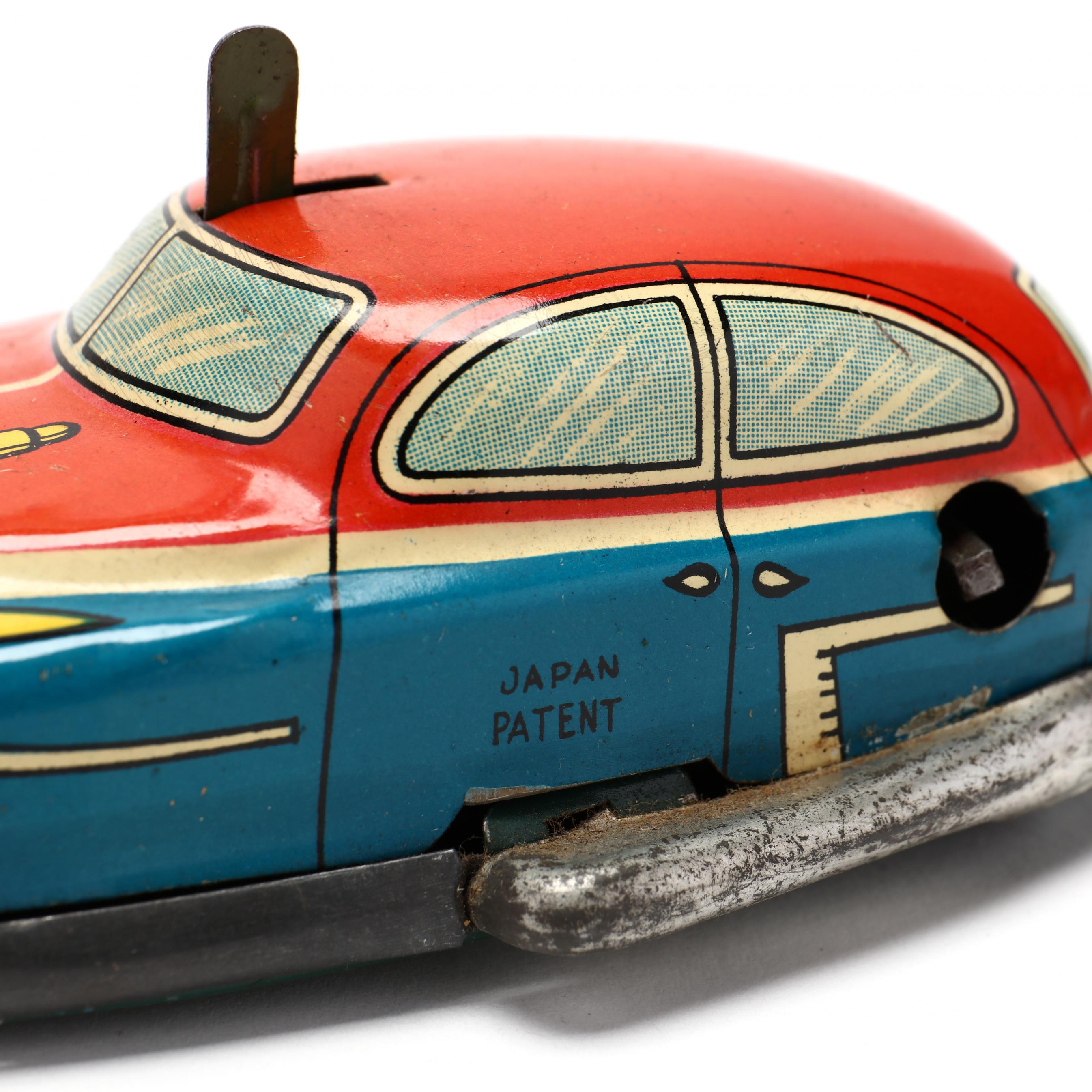 Two Tin Litho Garage and Car Toys (Lot 2429 - The Winter Two Tin Litho Garage and Car Toys (Lot 2429 - The Winter