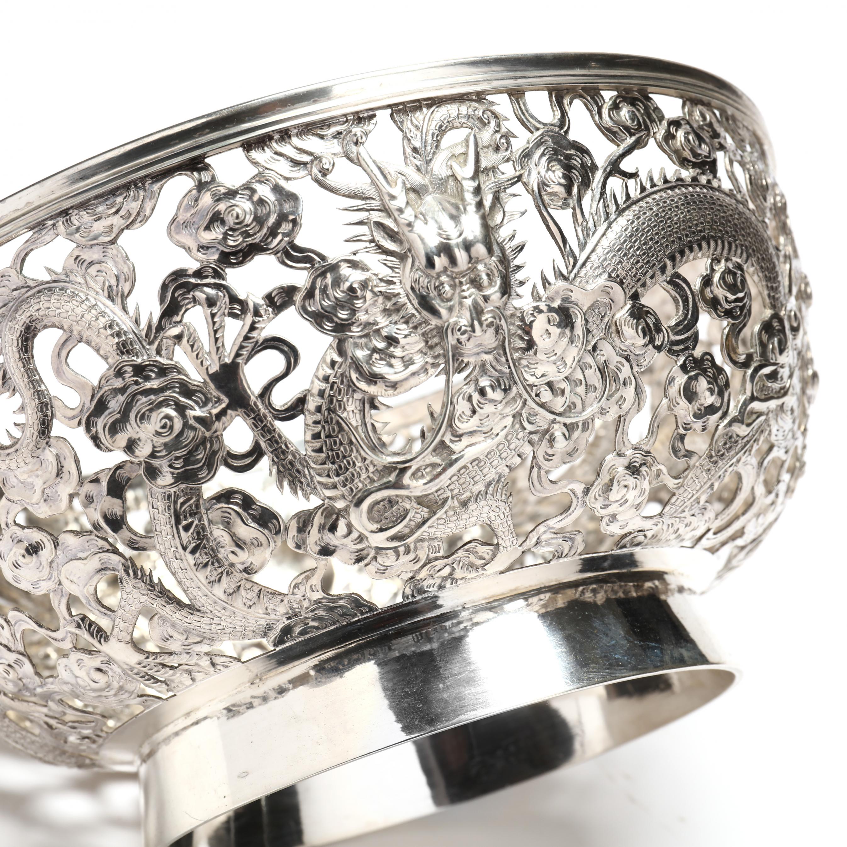 A Chinese Export Silver Dragon Bowl, Mark of Sing Fat and Wing Fat 