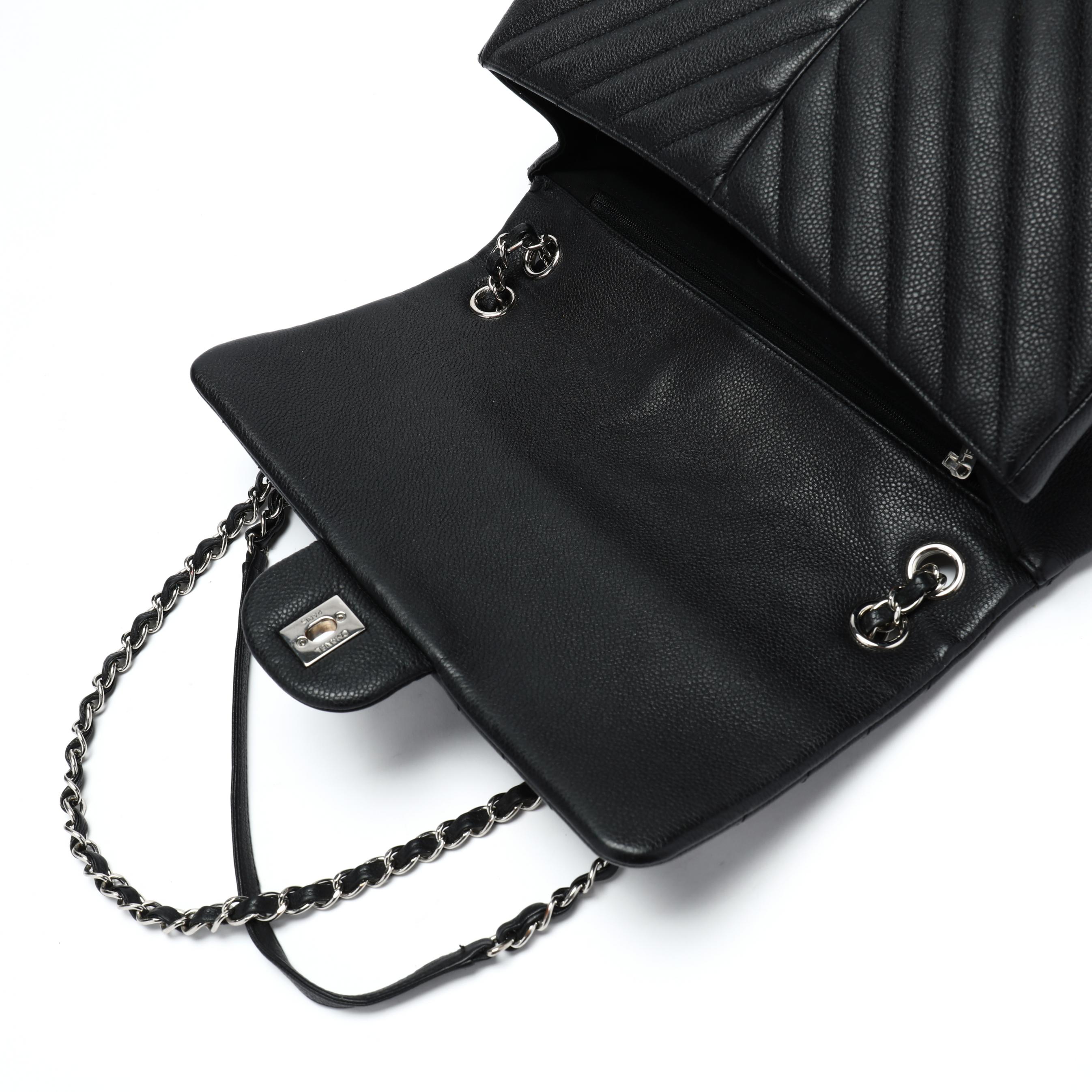 Sold at Auction: CHANEL - Jumbo Black Leather Flap Messenger