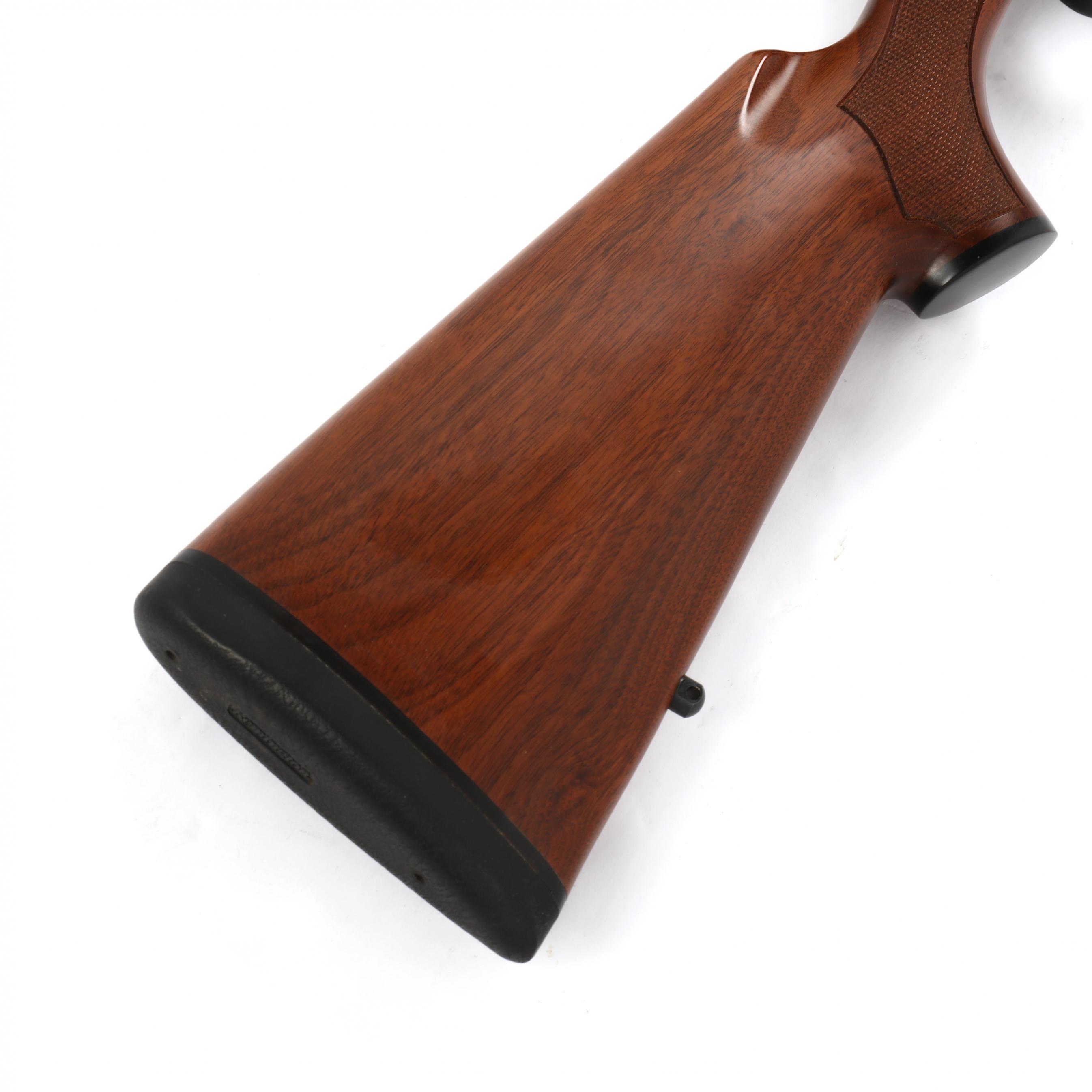 Remington 700 Deluxe Pencil Barrel 30-06 Rifle with Leupold Scope