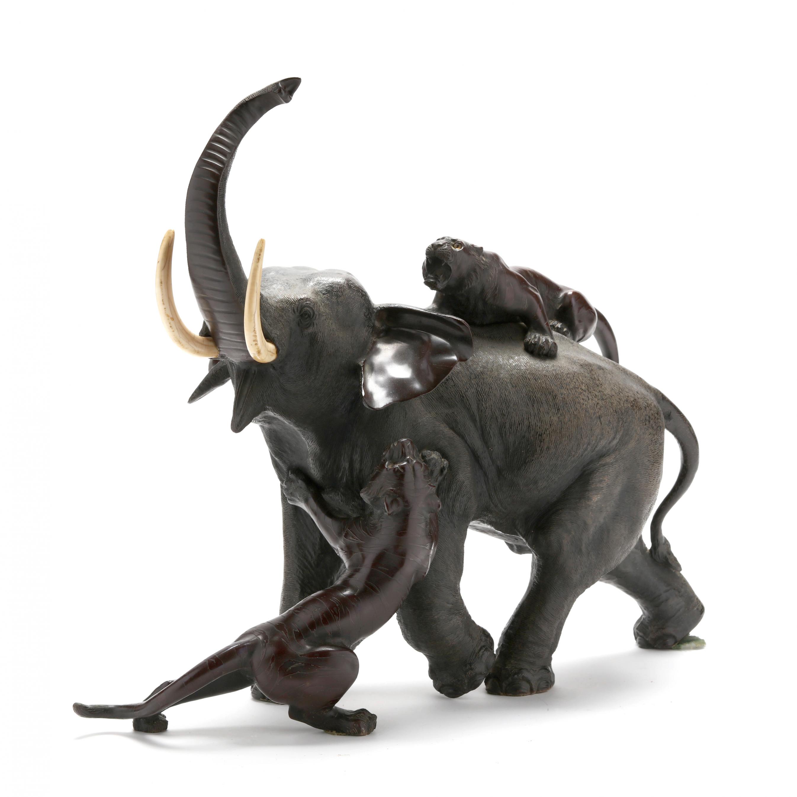 A Japanese Bronze Okimono of an Elephant Being Attacked by Tigers