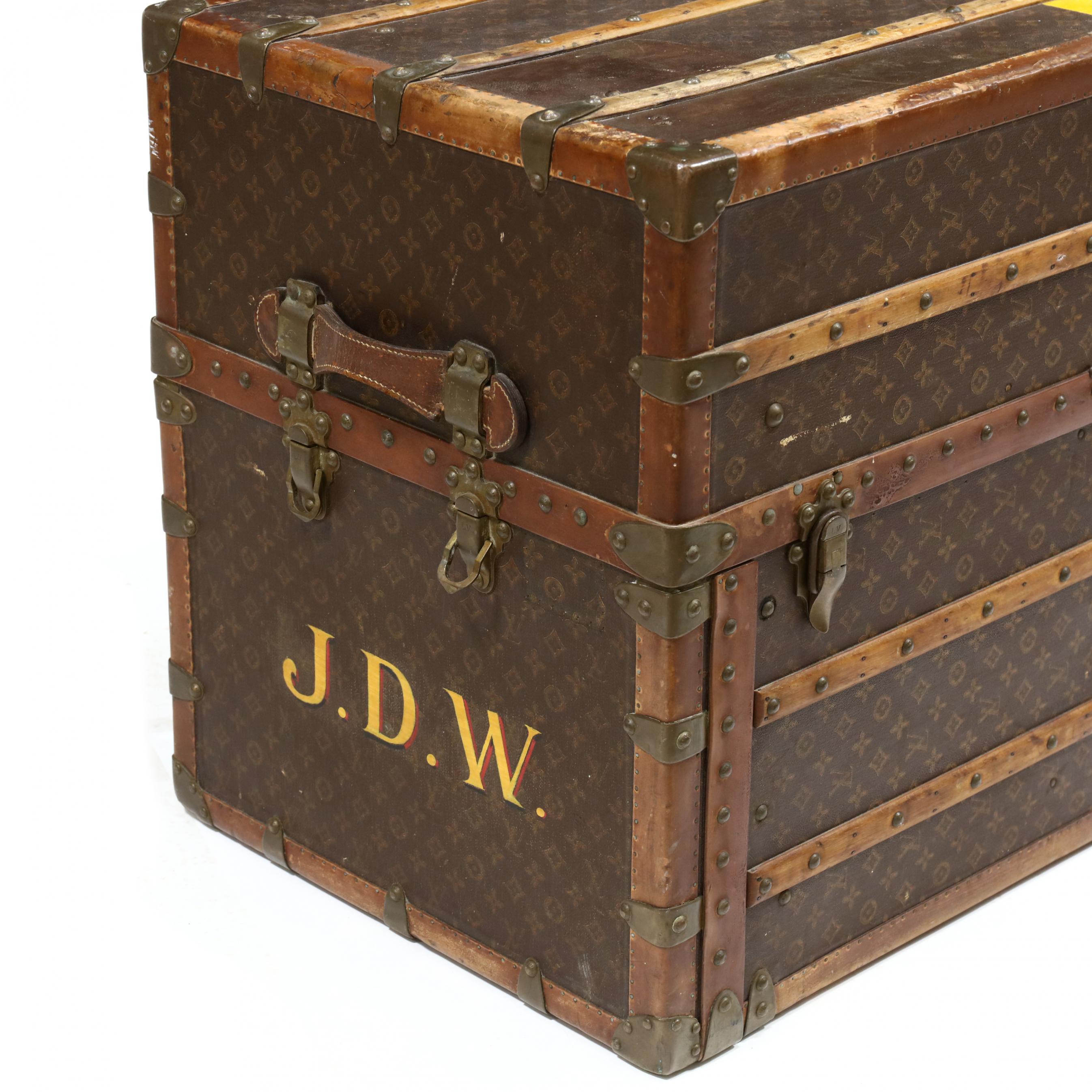Lot - Vintage Louis Vuitton trunk with key, retains stacking trays