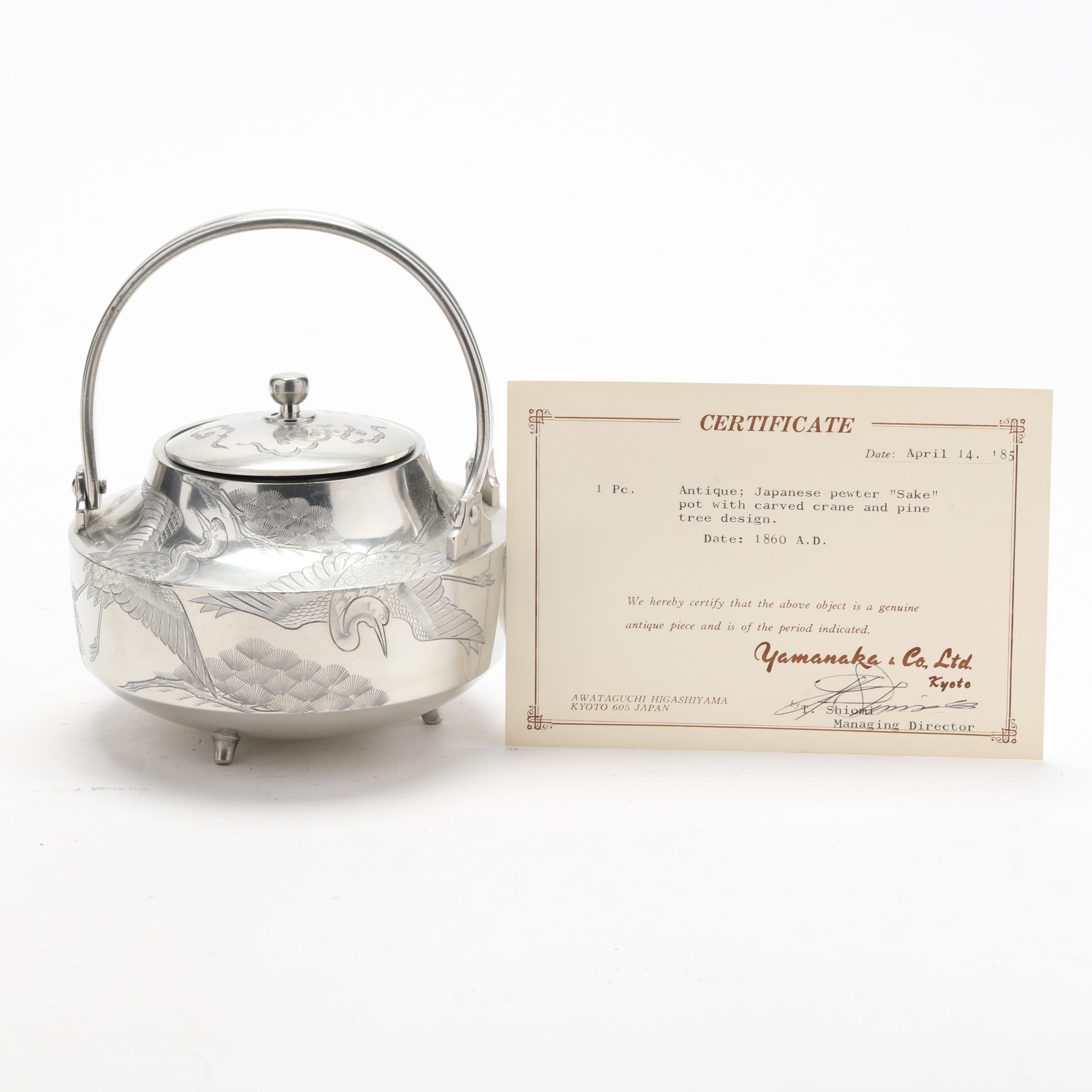A Japanese Pewter Sake Pot with Lacquer and Gilt Stand (Lot 1132