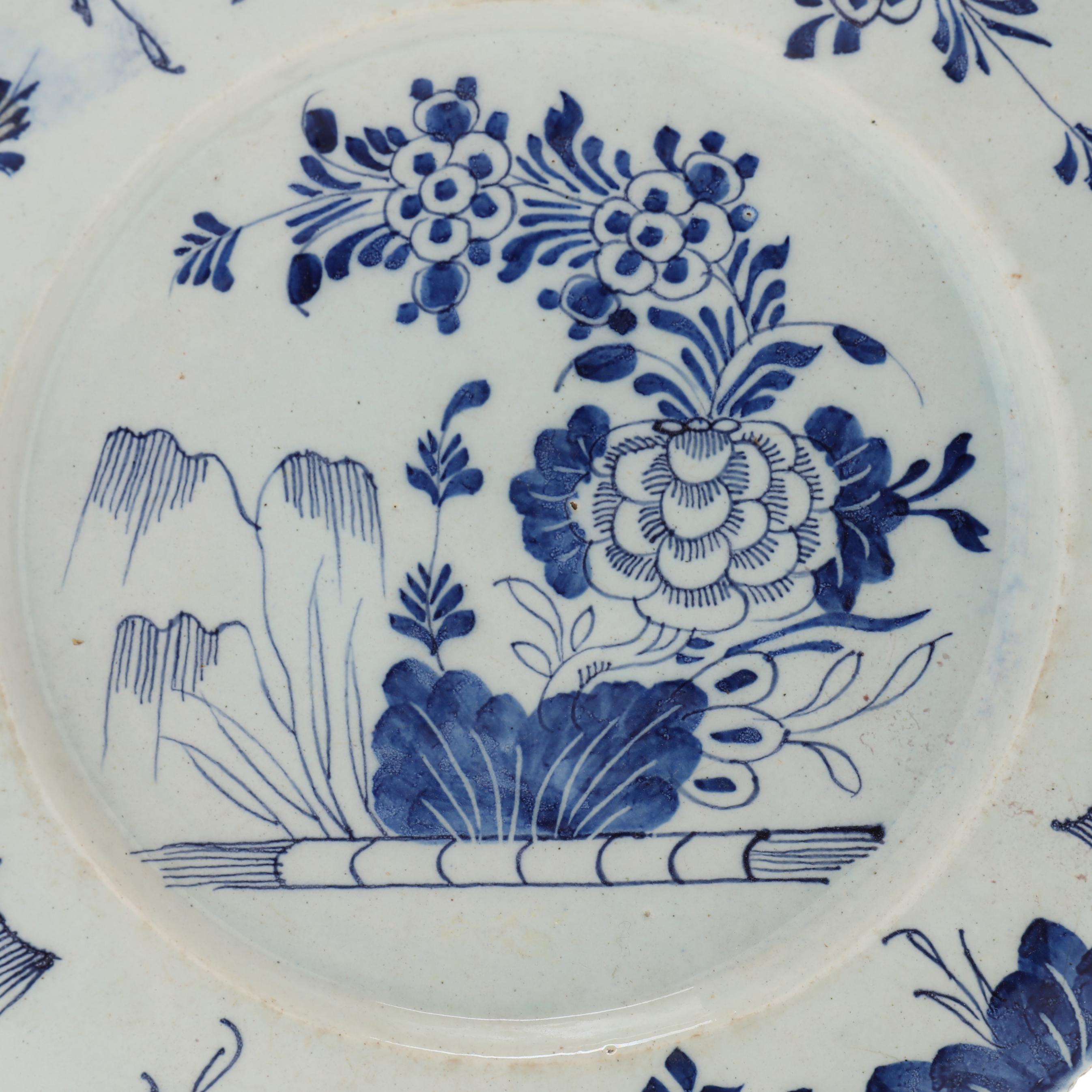 Five Antique Dutch Delft Blue and White Plates (Lot 1239