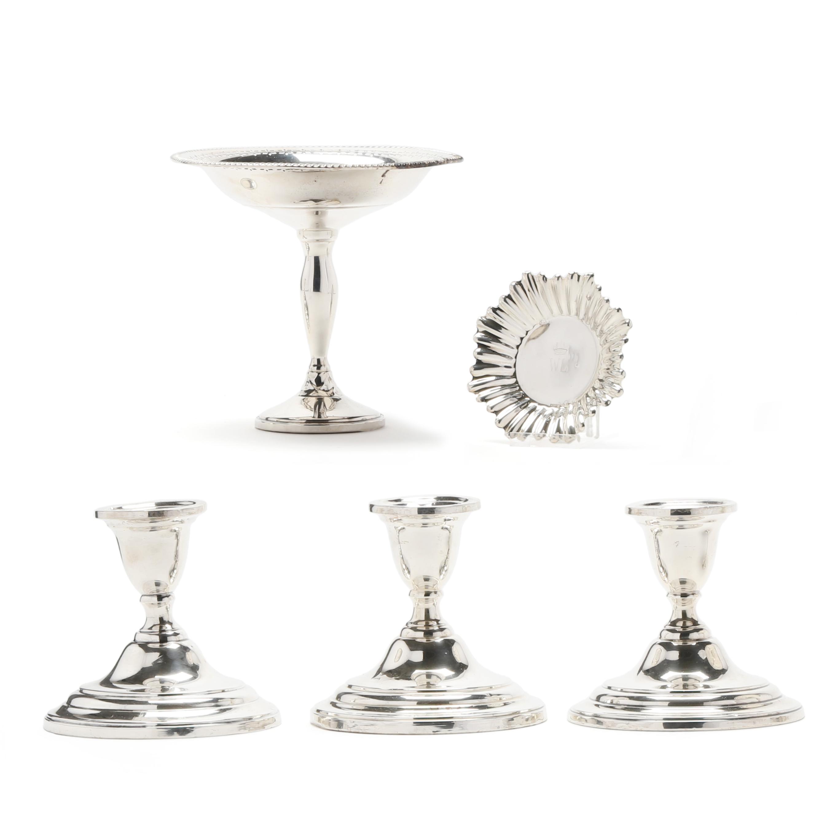 Four Sterling Silver Weighted Table Accessories and a Silver