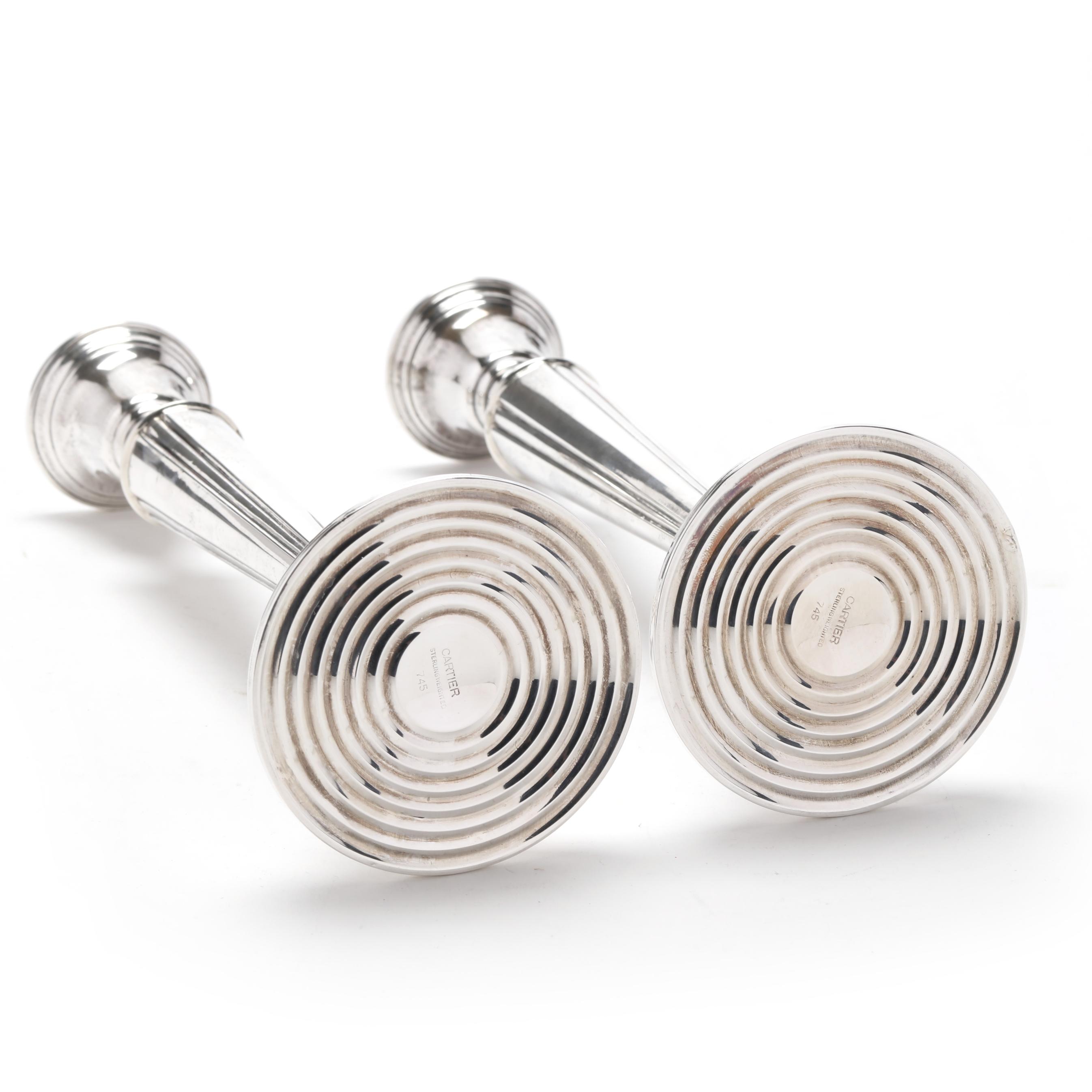 A Pair of Sterling Silver Candlesticks, Retailed by Cartier (Lot