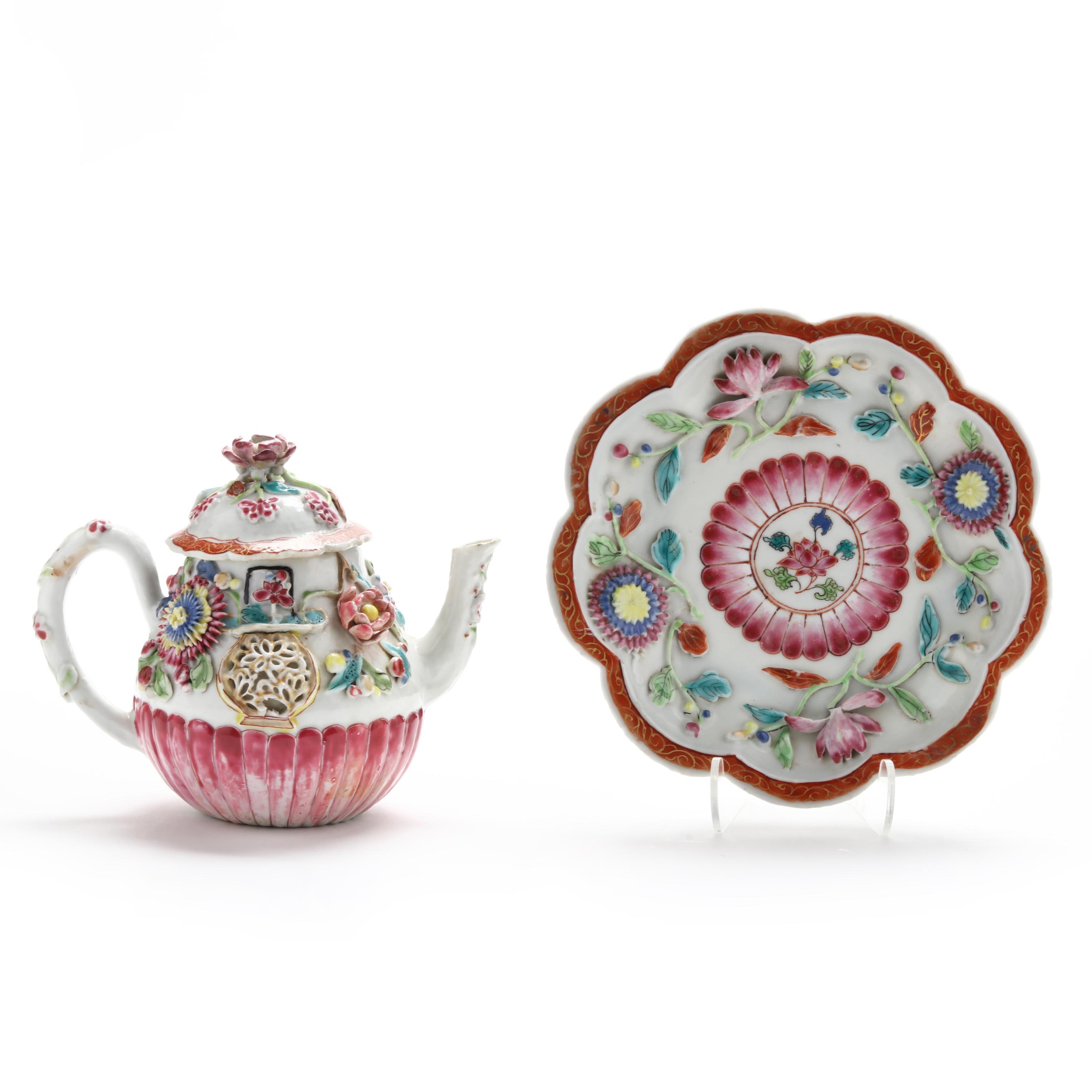 A Chinese Export Porcelain Molded and Relief Rose Teapot with
