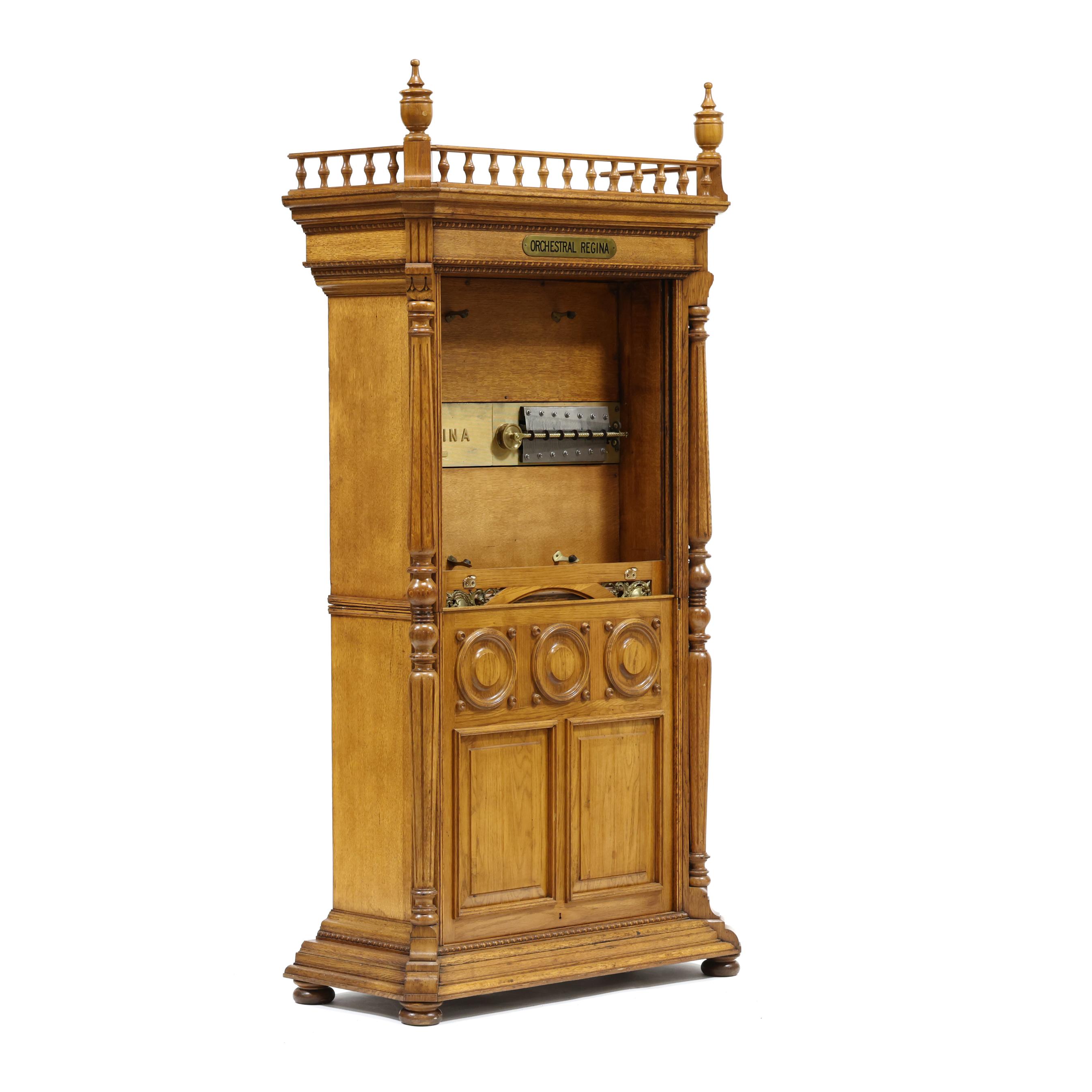 Impressive Orchestral Regina 27-Inch Upright Music Box (Lot