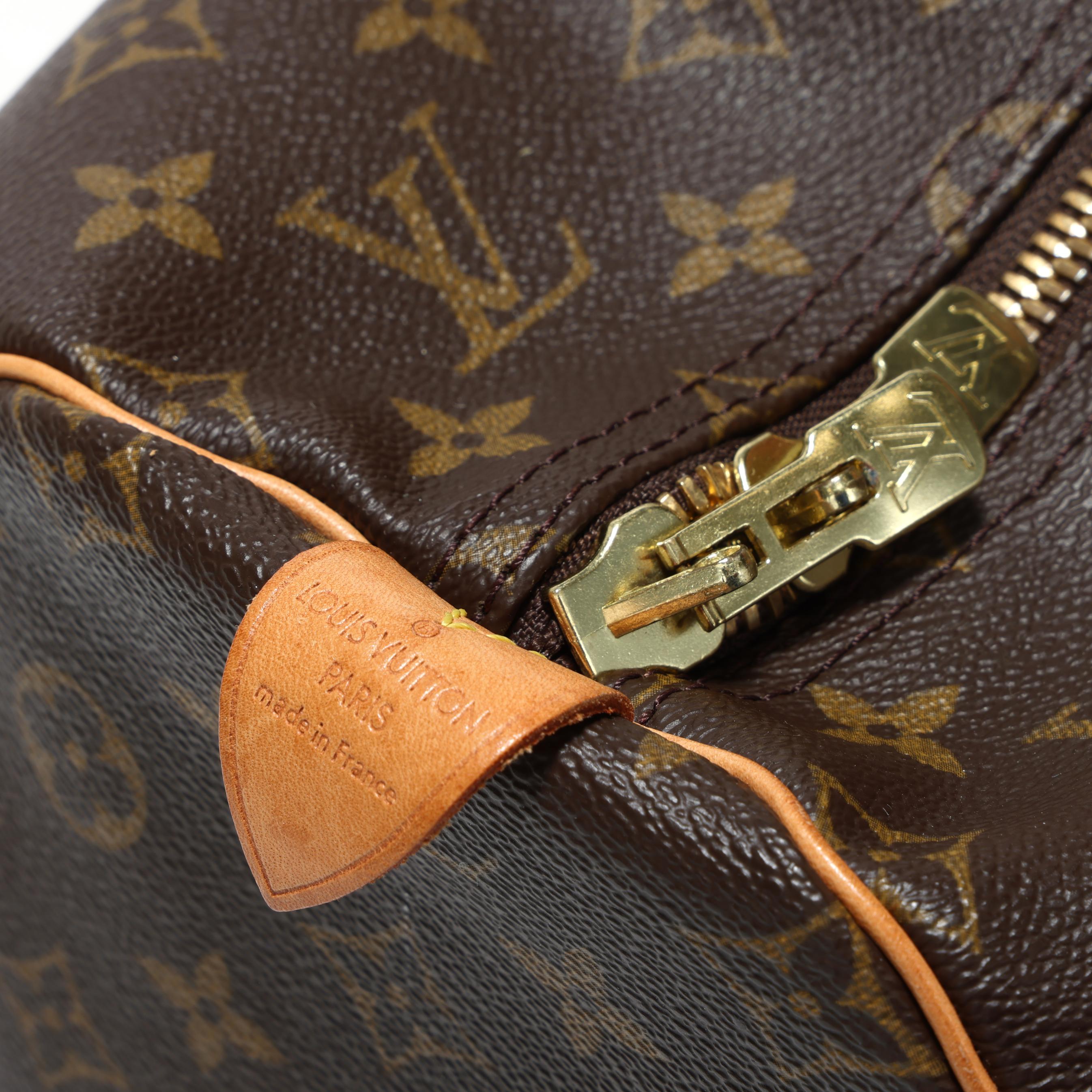 Canvas and Leather Keepall 55 Travel Bag, Louis Vuitton (Lot 3316