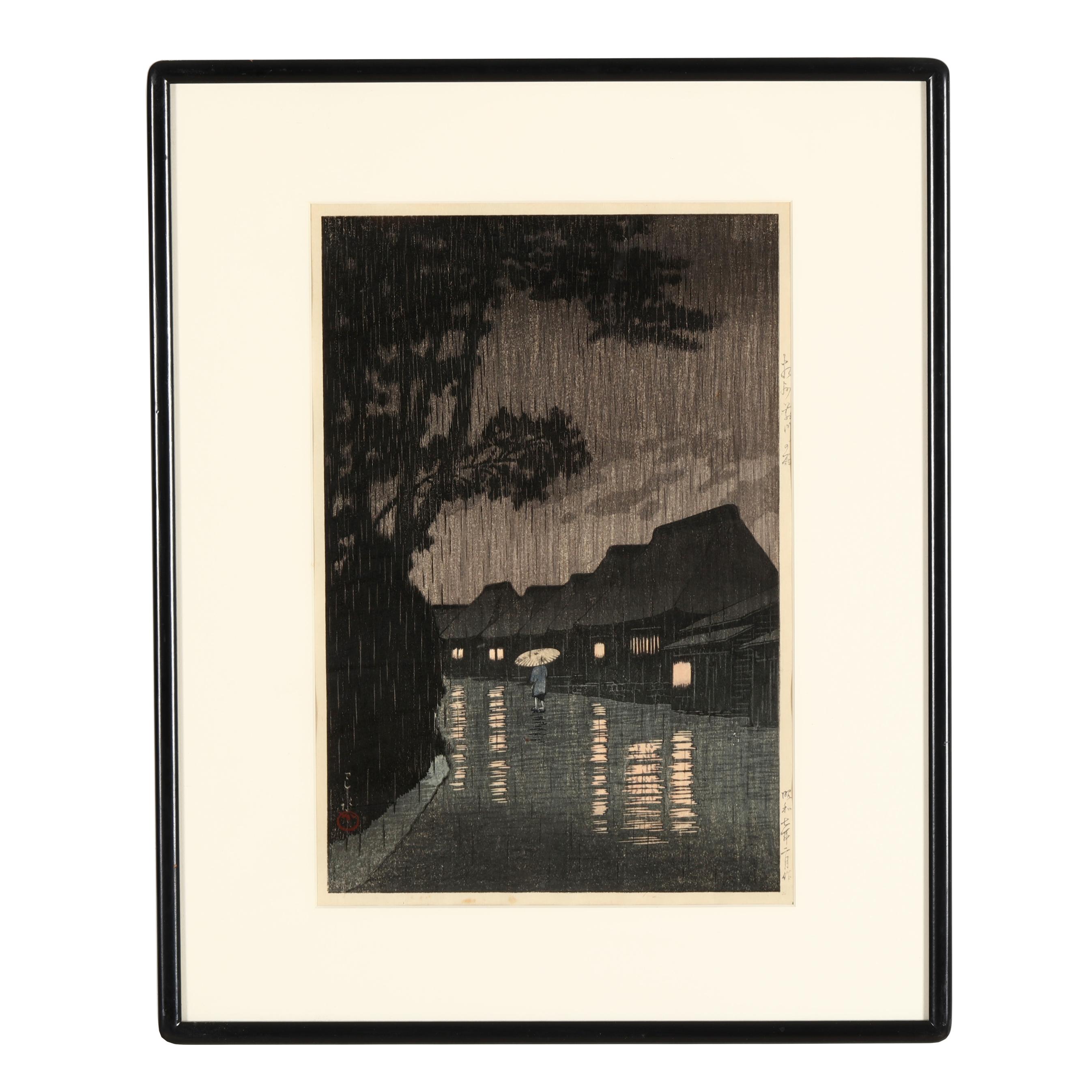 Kawase Hasui (Japanese, 1883-1957), Rain in Maekawa, Soshu (Lot