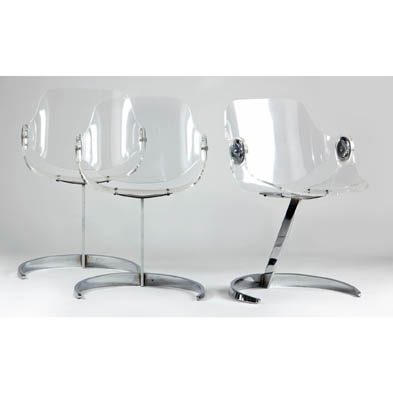 three-scimitar-lucite-chairs