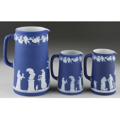 three-wedgwood-dark-blue-jasperware-pitchers