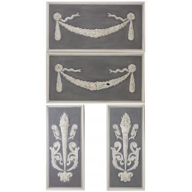 group-of-four-decorative-tin-wall-hangings