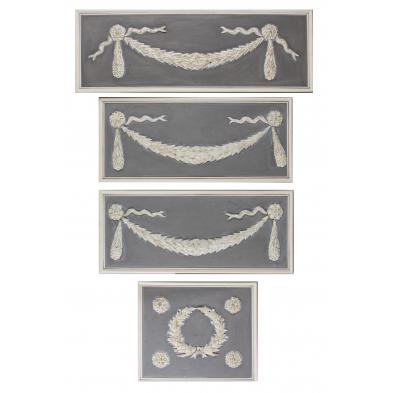 group-of-four-decorative-tin-wall-hangings