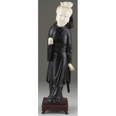 asian-carved-ebony-and-ivory-figural