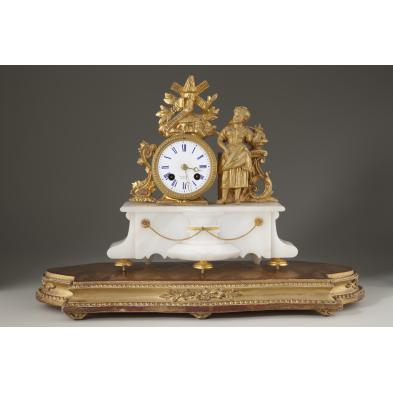 french-gilt-metal-figural-mantel-clock