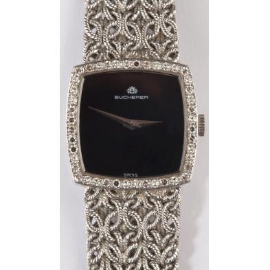 lady-s-gold-and-diamond-wristwatch-bucherer