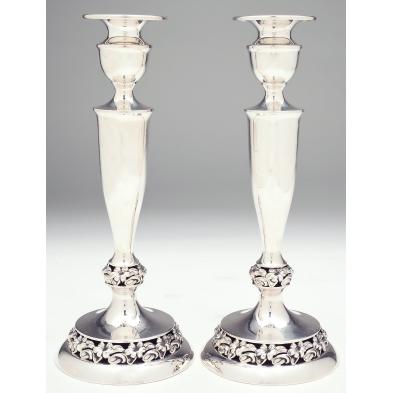 pair-of-sterling-silver-candlesticks
