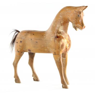 carved-wooden-model-of-a-horse