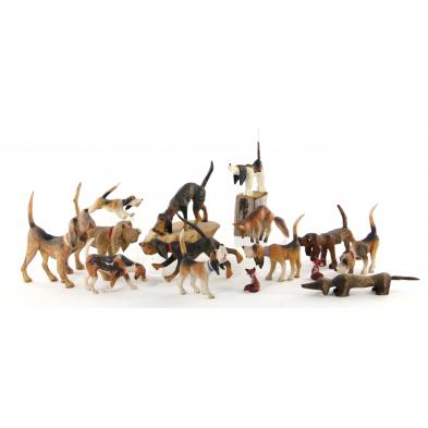 a-dozen-hand-carved-hunting-hounds-foxes