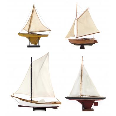 four-vintage-model-sailboats