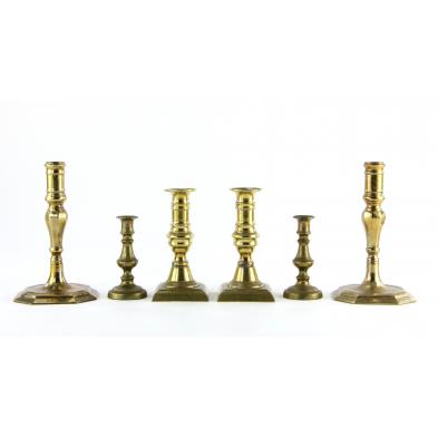 three-pair-of-brass-candlesticks