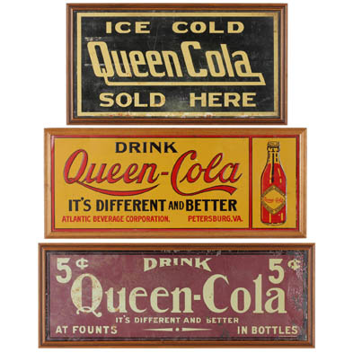 three-vintage-queen-cola-advertising-signs