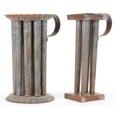 two-antique-tin-candle-molds