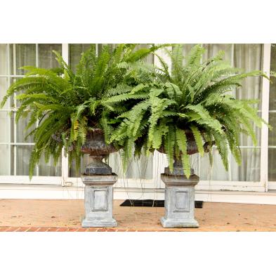 pair-of-lead-garden-urns-on-plinths