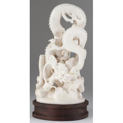 antique-chinese-ivory-dragon-sculpture
