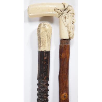 two-antique-ivory-handled-walking-sticks