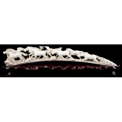 carved-ivory-tusk-of-horses-running