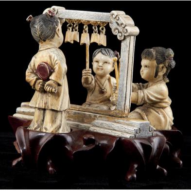 asian-ivory-carving-of-children-playing-bells