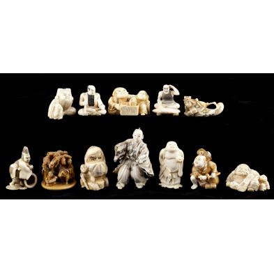 group-of-twelve-figural-netsukes