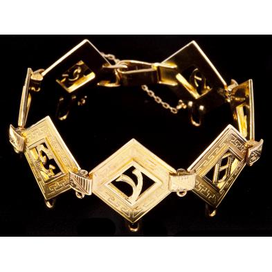 18kt-gold-greek-charm-bracelet