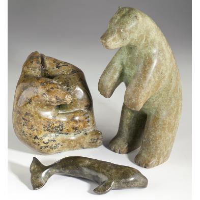 three-inuit-animal-carvings