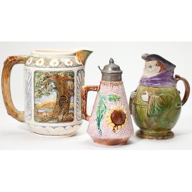 three-majolica-pitchers